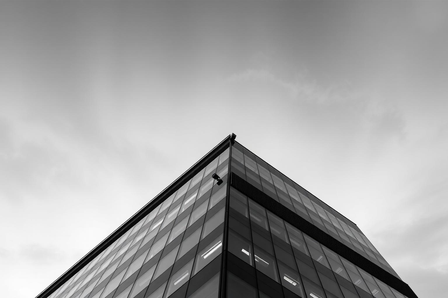Glass office tower with AI camera